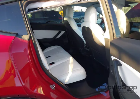 2022 Tesla Model Y Performance Dual Motor All-Wheel Drive z USA, uszkodzony, nr VIN 7SAYGDEFXNF511441